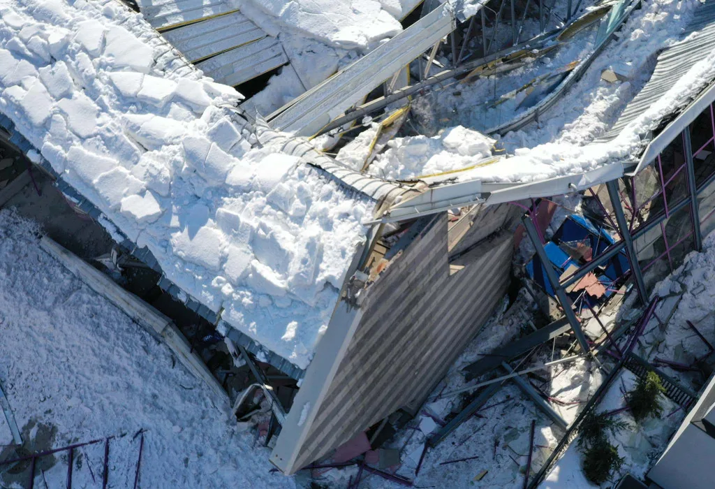 snow and ice roof damage repair